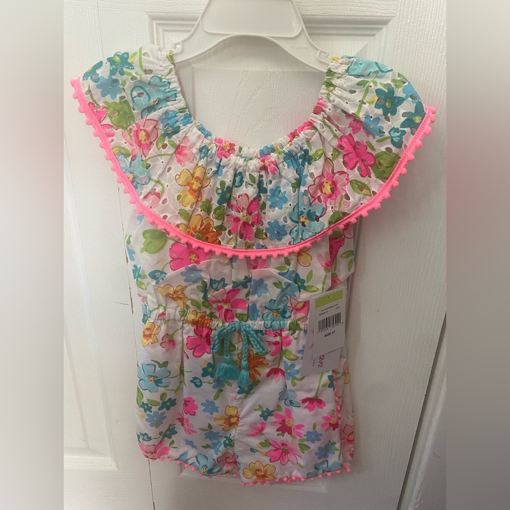 Size 4T girls romper. Never worn! New with tags!